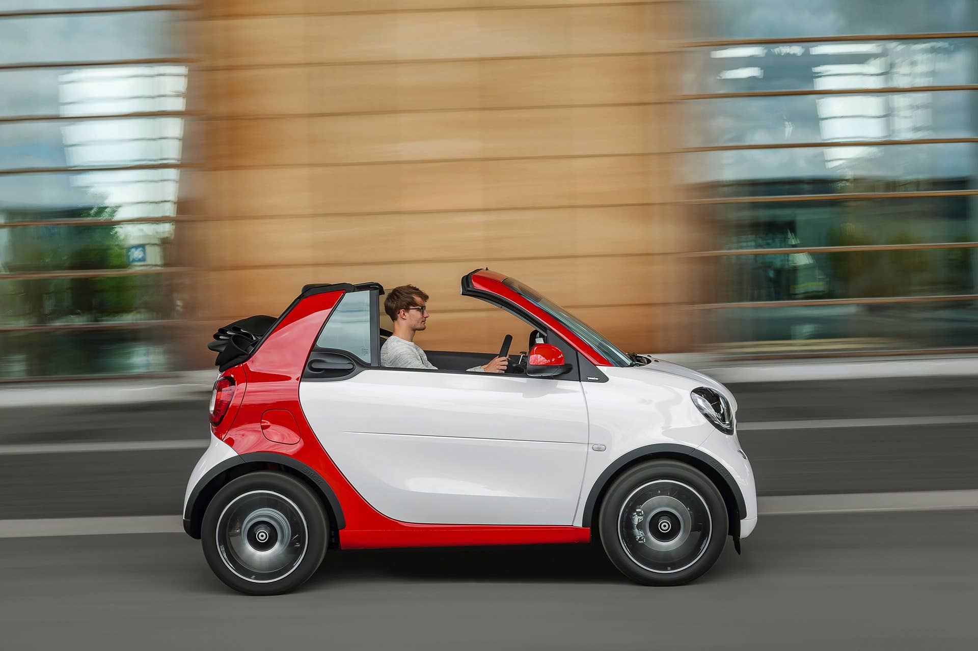 The 2016 Smart Fortwo Cabriolet, passion trim, side view top down.
