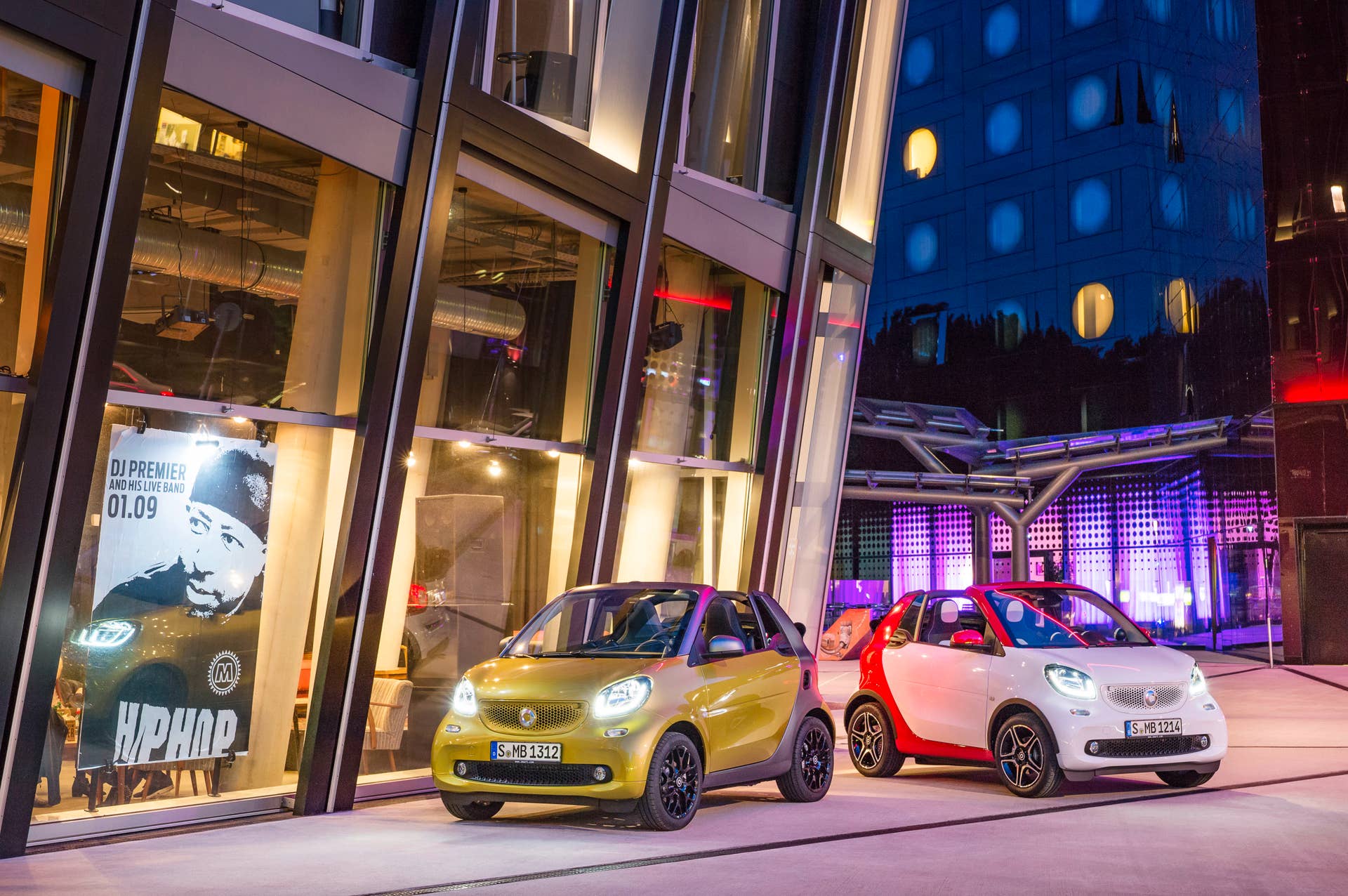 The 2016 Smart Fortwo Cabriolet, front three-quarter, two models, static.