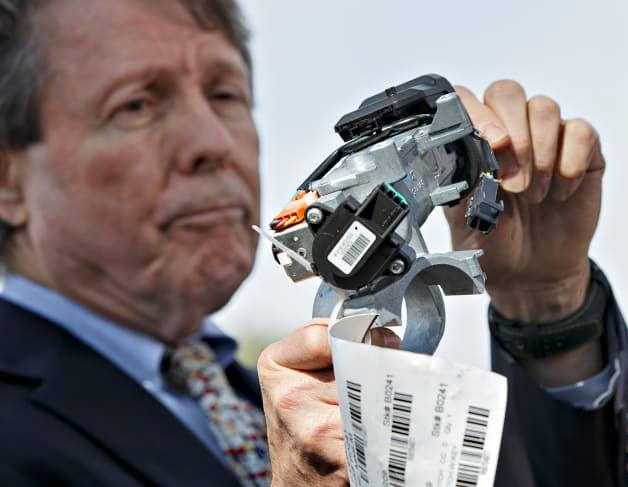 Clarence Ditlow of Center for Automotive Safety holds up GM ignition switch
