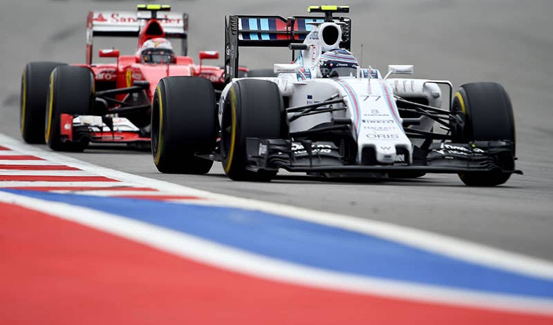 Ferrari driver Kimi Raikkonen chases the Williams of Valtteri Bottas at the 2015 Russian Grand Prix.