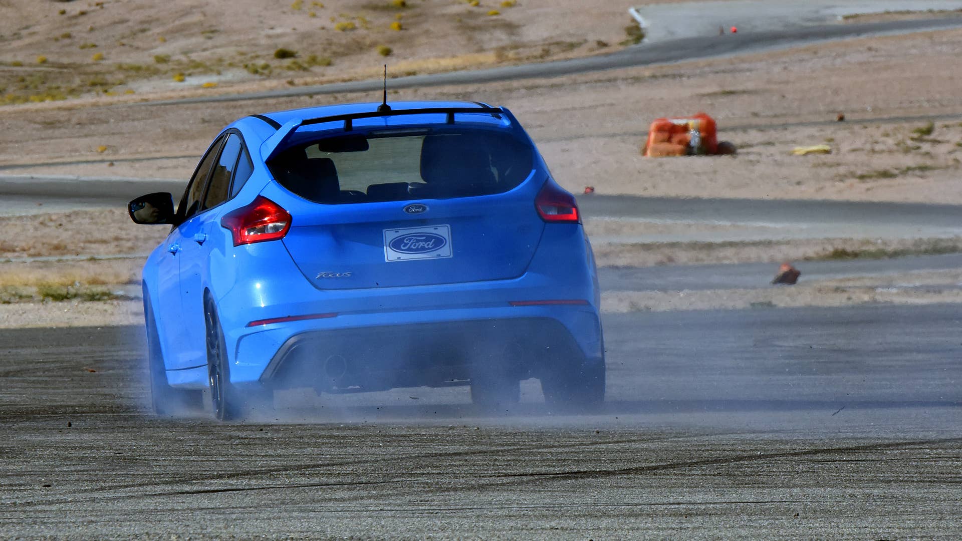ROSEMOND, CA., November 16, 2015--Ford Motor Company's all-new 350 horsepower, 2016 Focus RS speeds and drifts around Willow Springs Raceway for journalists. Photo by: Sam VarnHagen