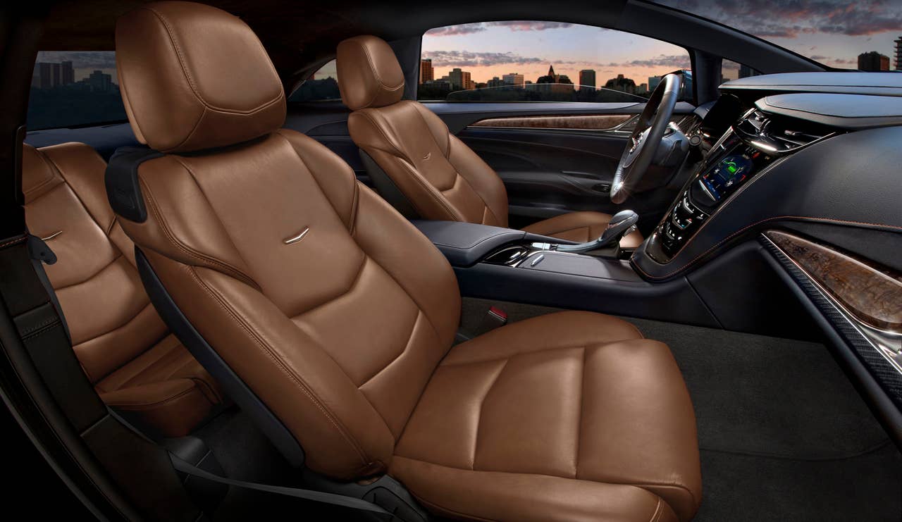 The 2014 Cadillac ELRs 2+2 layout is driver-focused and luxurious  distinctive for its craftsmanship and connectivity. The leather-trimmed interior blends authentic chrome and wood accents  and available carbon fiber trim  as well as a sumptuous microfiber headliner and steering wheel covered in leather and sueded microfiber. The ELR is the industrys only electric vehicle offered by a full-line luxury automaker. Production starts in late 2013.