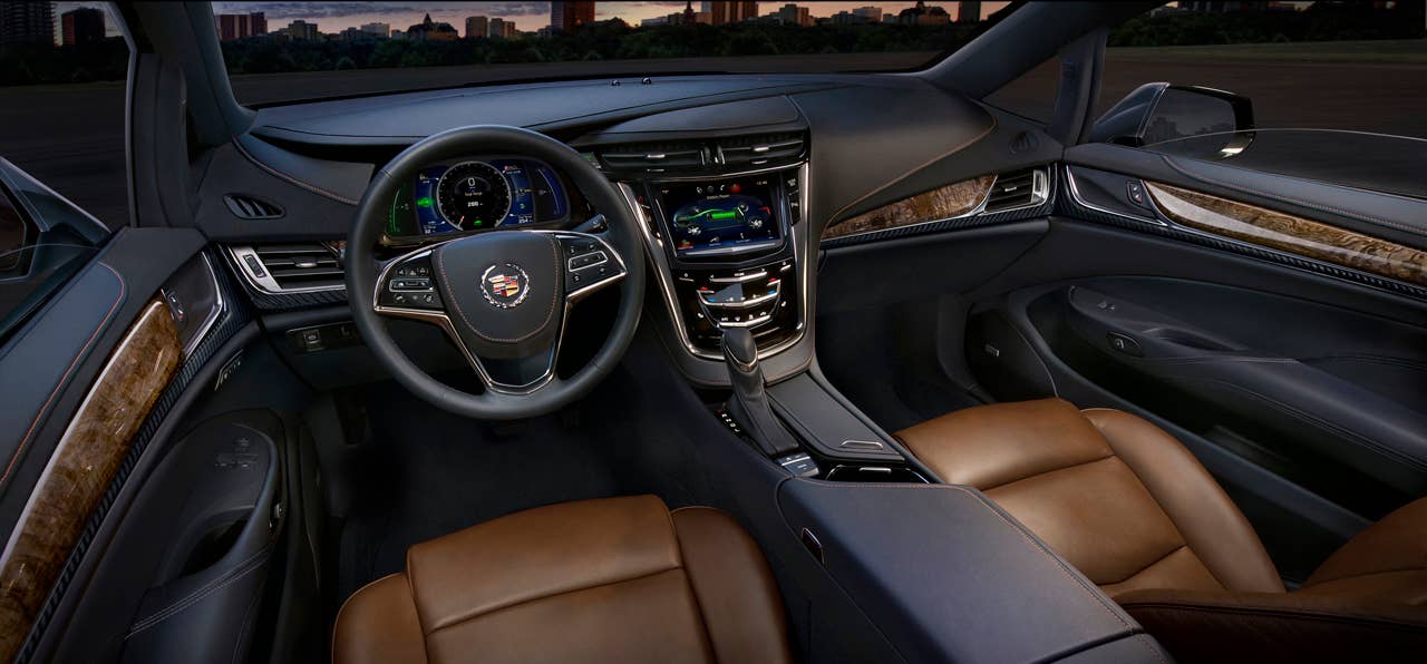 The 2014 Cadillac ELRs 2+2 layout is driver-focused and luxurious  distinctive for its craftsmanship and connectivity. The leather-trimmed interior blends authentic chrome and wood accents  and available carbon fiber trim  as well as a sumptuous microfiber headliner and steering wheel covered in leather and sueded microfiber. The ELR is the industrys only electric vehicle offered by a full-line luxury automaker. Production starts in late 2013.