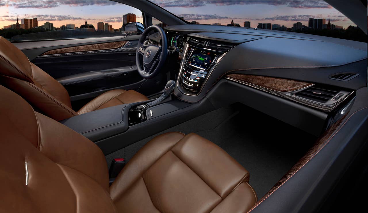 The 2014 Cadillac ELRs 2+2 layout is driver-focused and luxurious  distinctive for its craftsmanship and connectivity. The leather-trimmed interior blends authentic chrome and wood accents  and available carbon fiber trim  as well as a sumptuous microfiber headliner and steering wheel covered in leather and sueded microfiber. The ELR is the industrys only electric vehicle offered by a full-line luxury automaker. Production starts in late 2013.