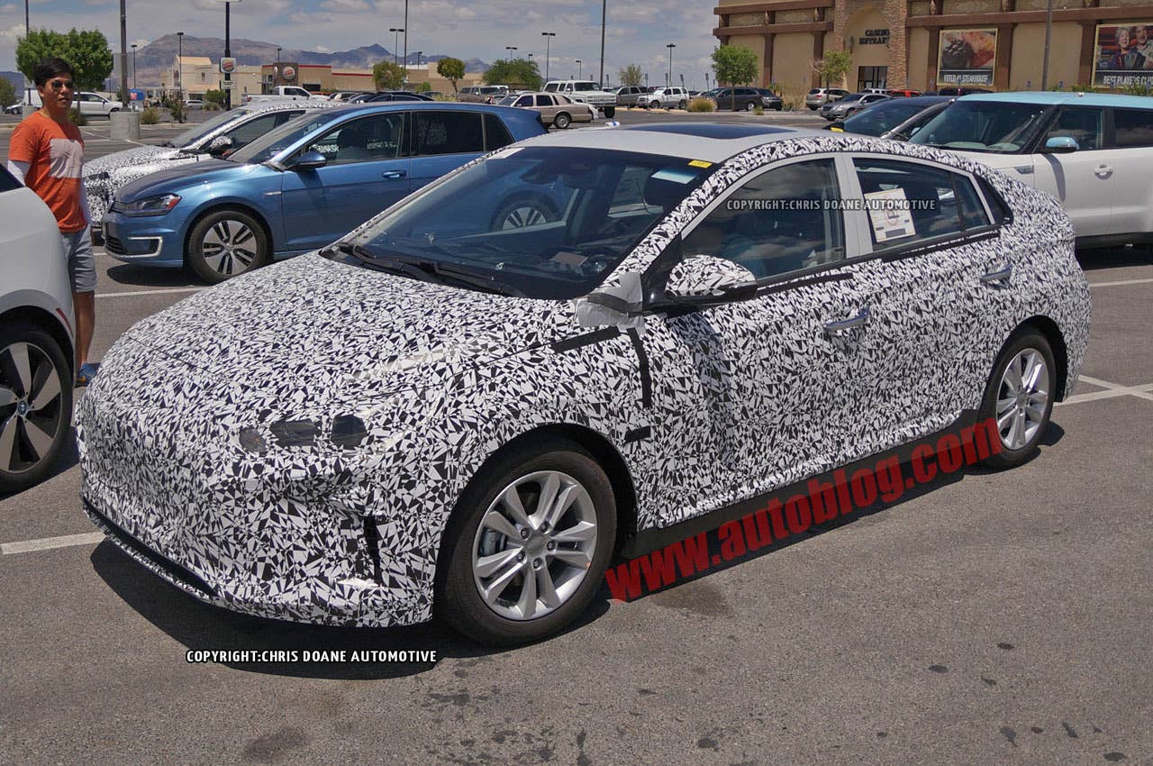 camouflaged hyundai prius-fighter spy shot headlights detail
