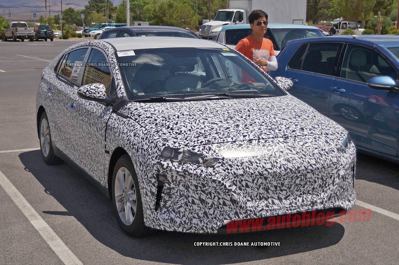 camouflaged hyundai prius-fighter spy shot front detail