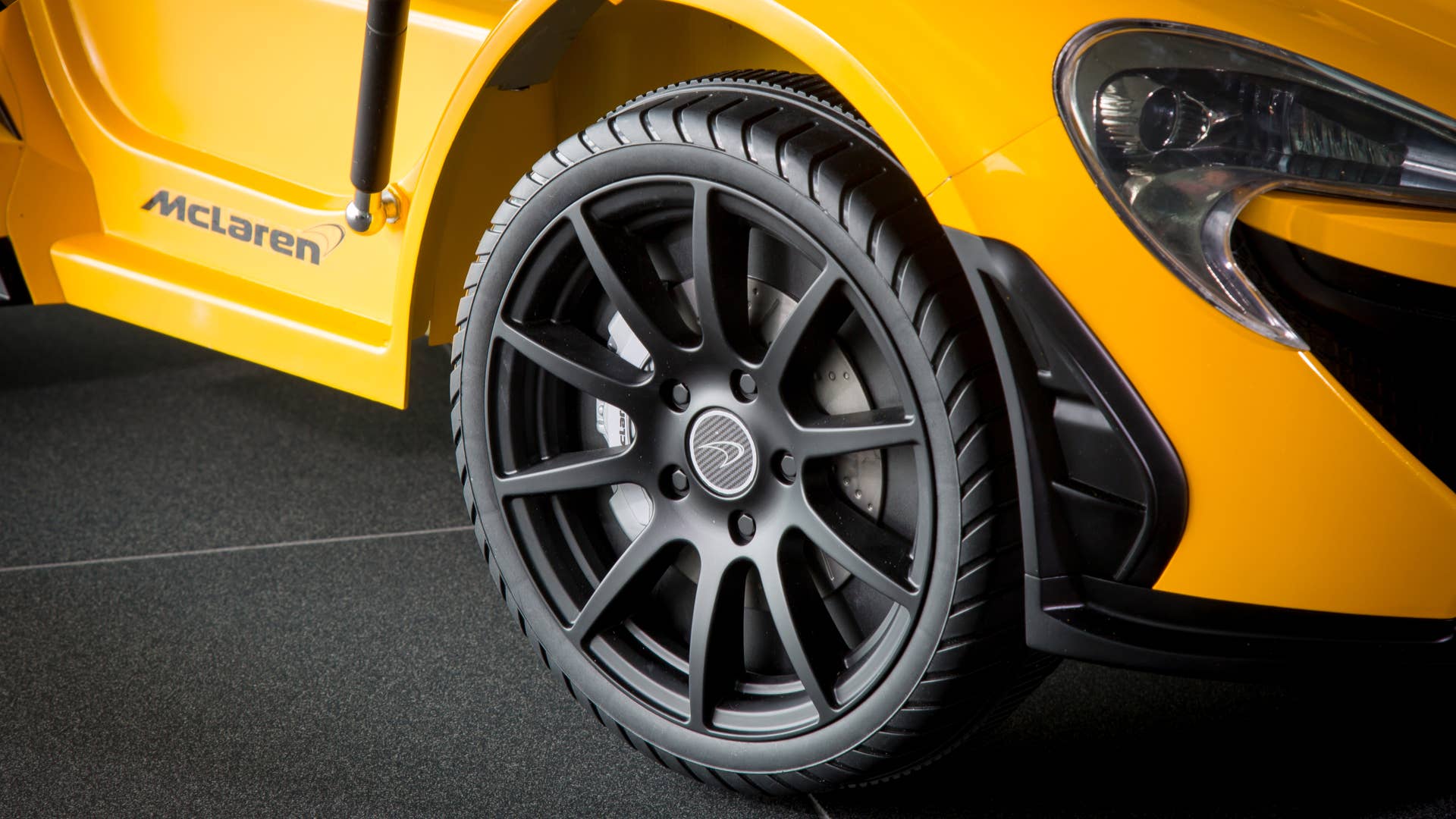 McLaren P1 toy car wheel close-up