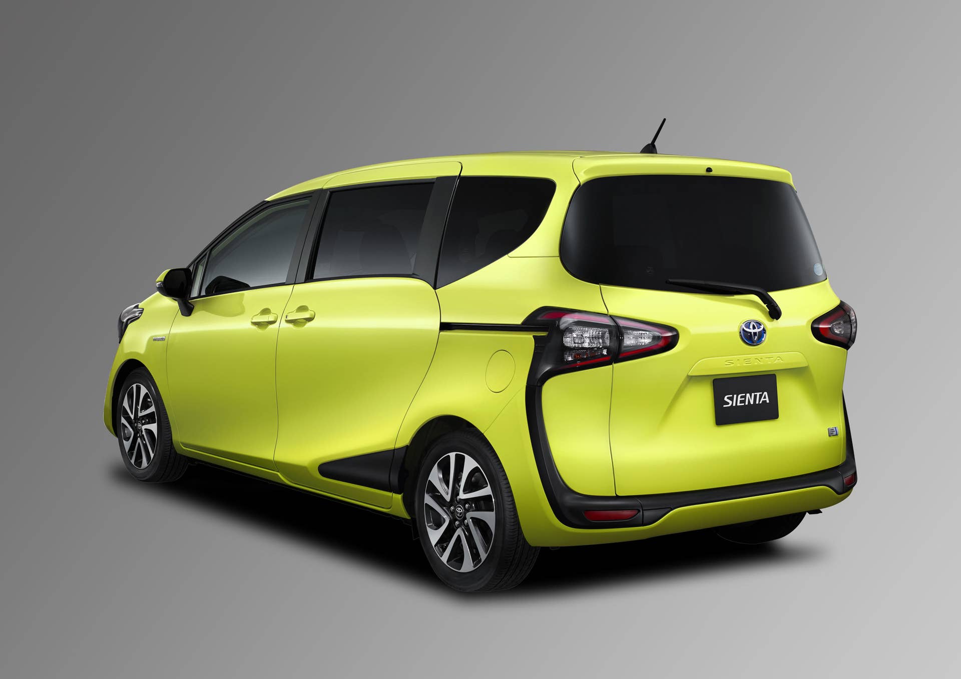 yellow toyota sienta rear three quarters