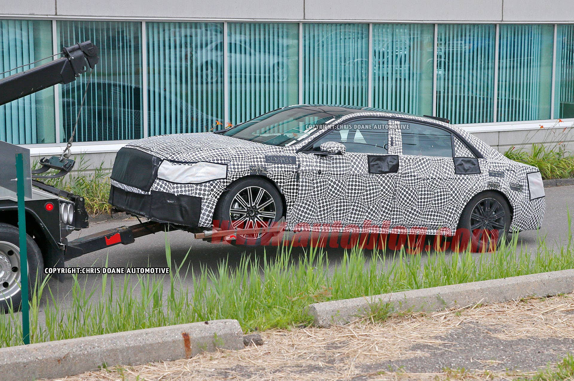 camouflage lincoln continental tow truck broken