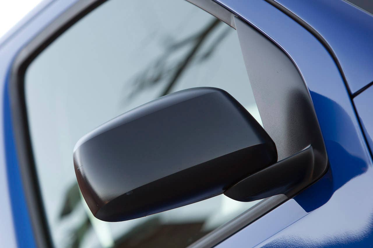 2012 Nissan Frontier Crew Cab 4x4 side mirror