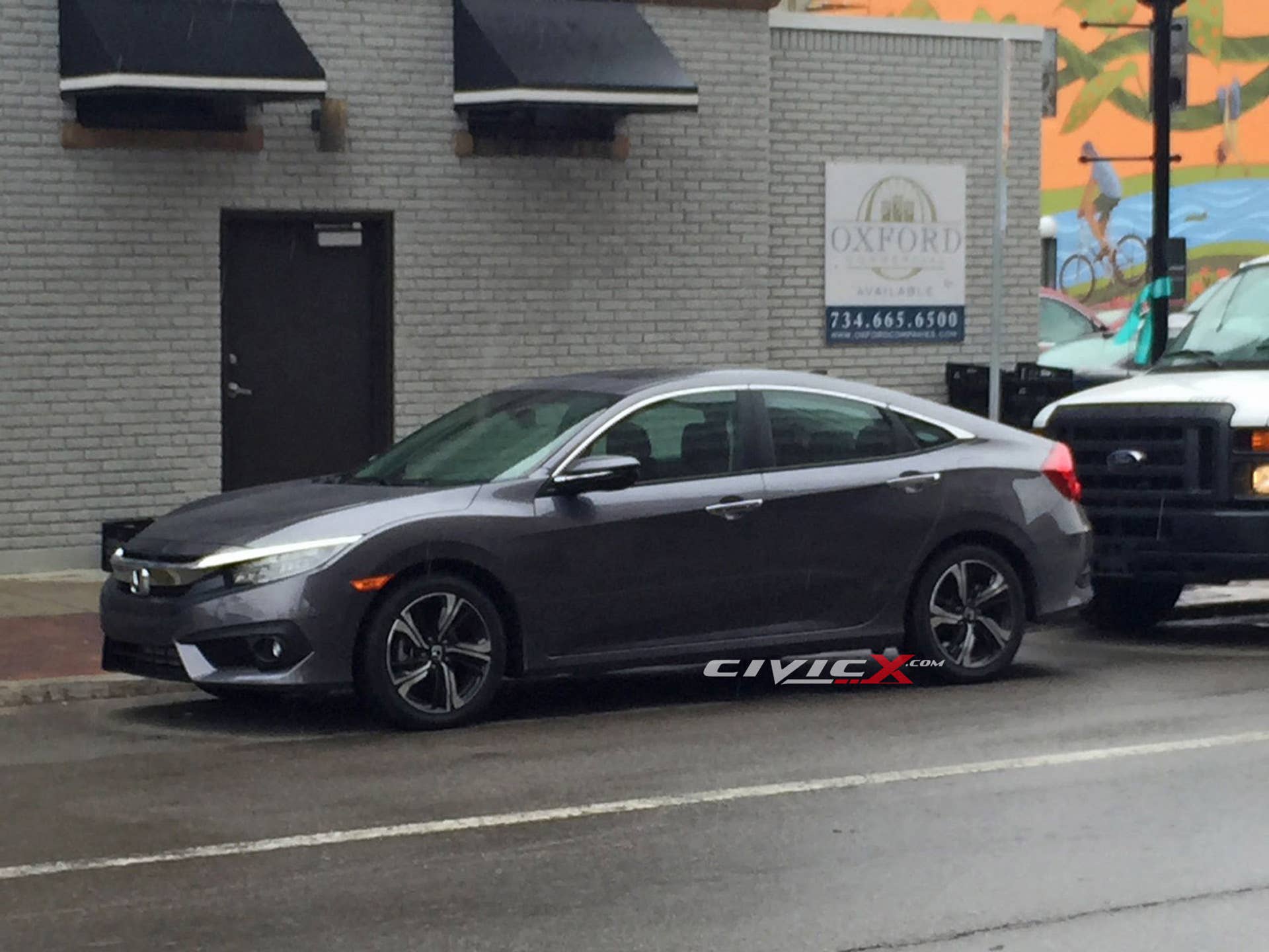 honda civic undisguised spied parked street rain