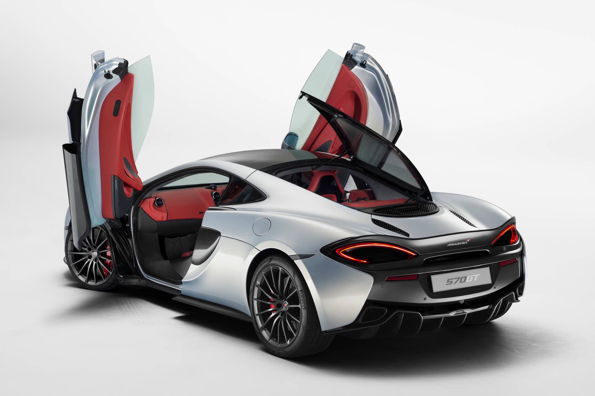 McLaren 570GT with its doors and hatch open
