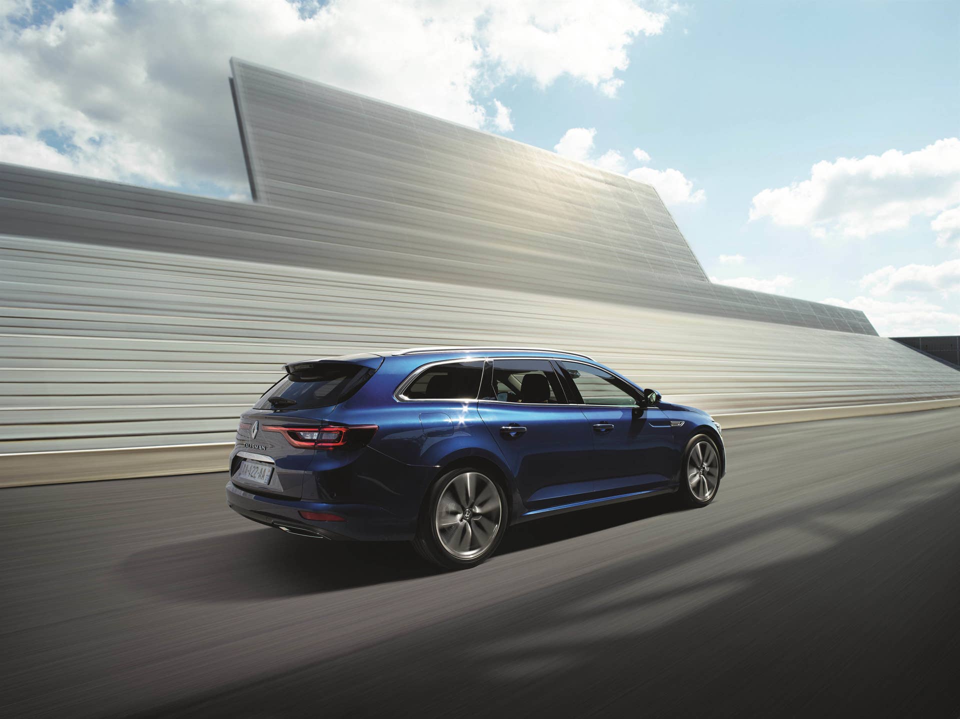 Renault Talisman Estate driving rear 3/4