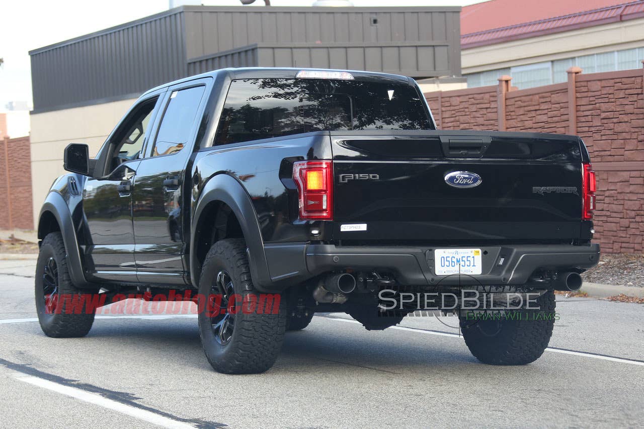 black 2017 ford f-150 raptor spy shot crew cab profile rear three quarters design