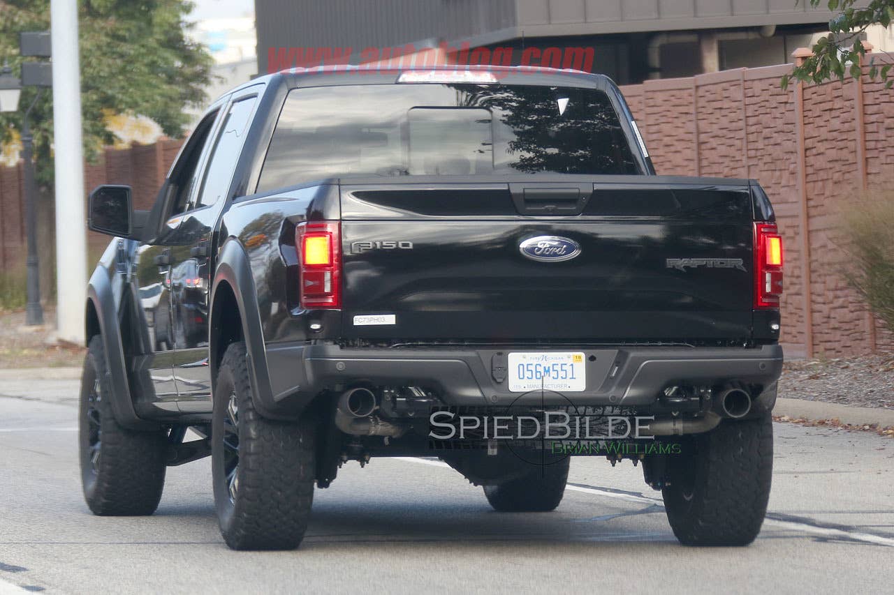 black 2017 ford f-150 raptor spy shot crew cab profile rear design