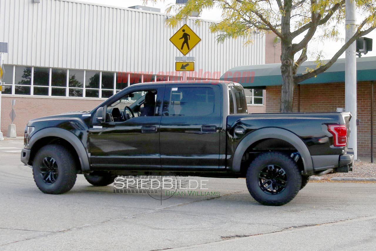 black 2017 ford f-150 raptor spy shot crew cab profile