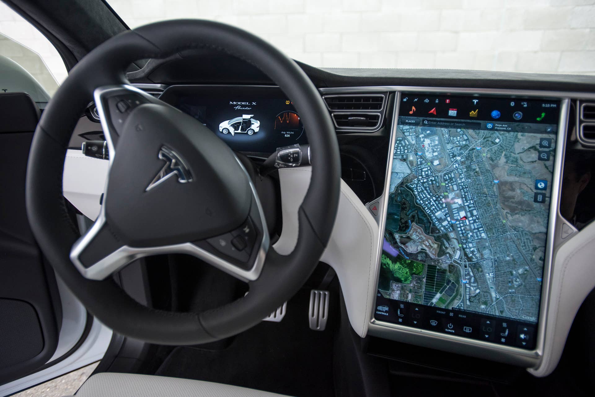 The interior of a Tesla Motors Inc. Model X sport utility vehicle (SUV) is displayed during an event in Fremont, California, U.S., on Tuesday, Sept. 29, 2015. Elon Musk handed over the first six Model X SUVs to owners in California Tuesday night, as Tesla reached a milestone of having two all-electric vehicles in production at the same time. Photographer: David Paul Morris/Bloomberg via Getty Images