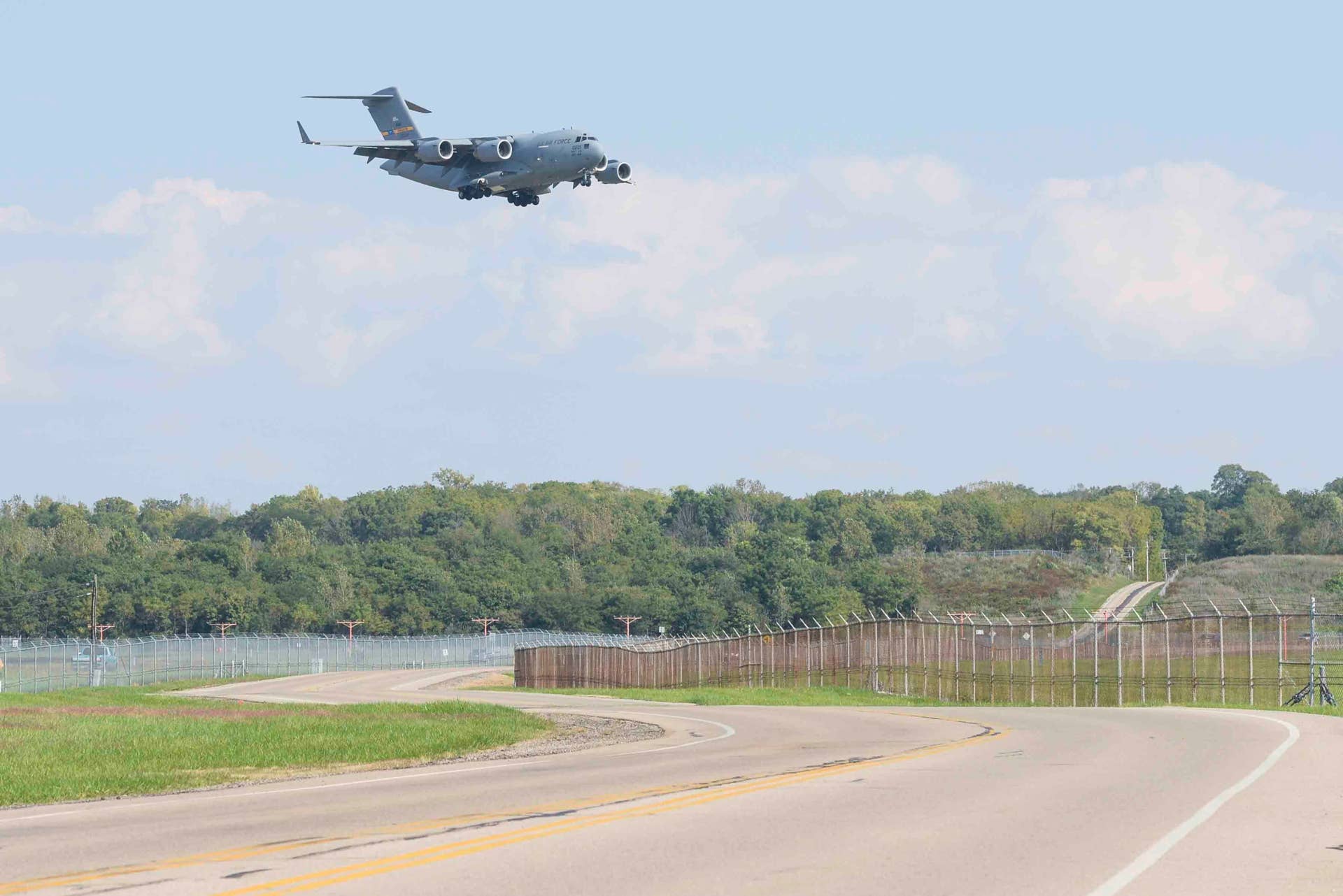 A C-17 Globemaster III from Joint Base Charleston, South Carolina, lands at Wright-Patterson Air Force Base, Ohio, for safe haven support, Oct. 5, 2016. The C-17 was one of several planes using Wright-Patterson AFB as a Safe Haven while Hurricane Matthew threatens their home station. (U.S. Air Force photo by Wesley Farnsworth / Released)