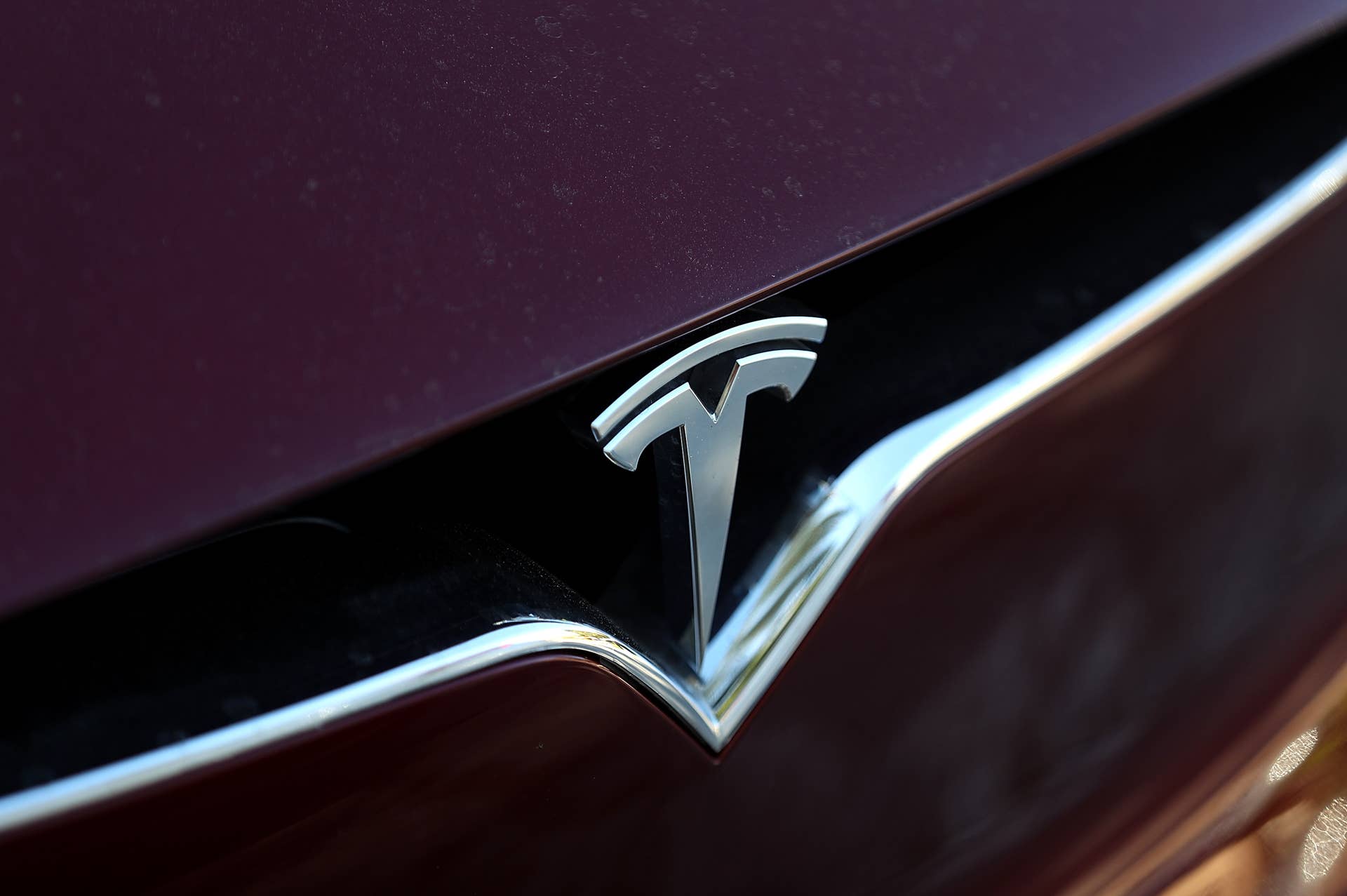 LOS ANGELES, CA - FEBRUARY 23: The Tesla is displayed on the front of a Tesla Model X on February 23, 2017 in Los Angeles, California. Tesla shares dropped over 5 percent on Thursday after a mixed fourth quarter earnigns report. The electric car company reported better-than-expected revenue of $2.28 billion compared to a projected estimate of $2.2 billion. The earnings were up 88% year over year, but well below the previous quarter's growth of 145%. The company also reported a per-share loss minus items of 69 cents. (Photo by Justin Sullivan/Getty Images)