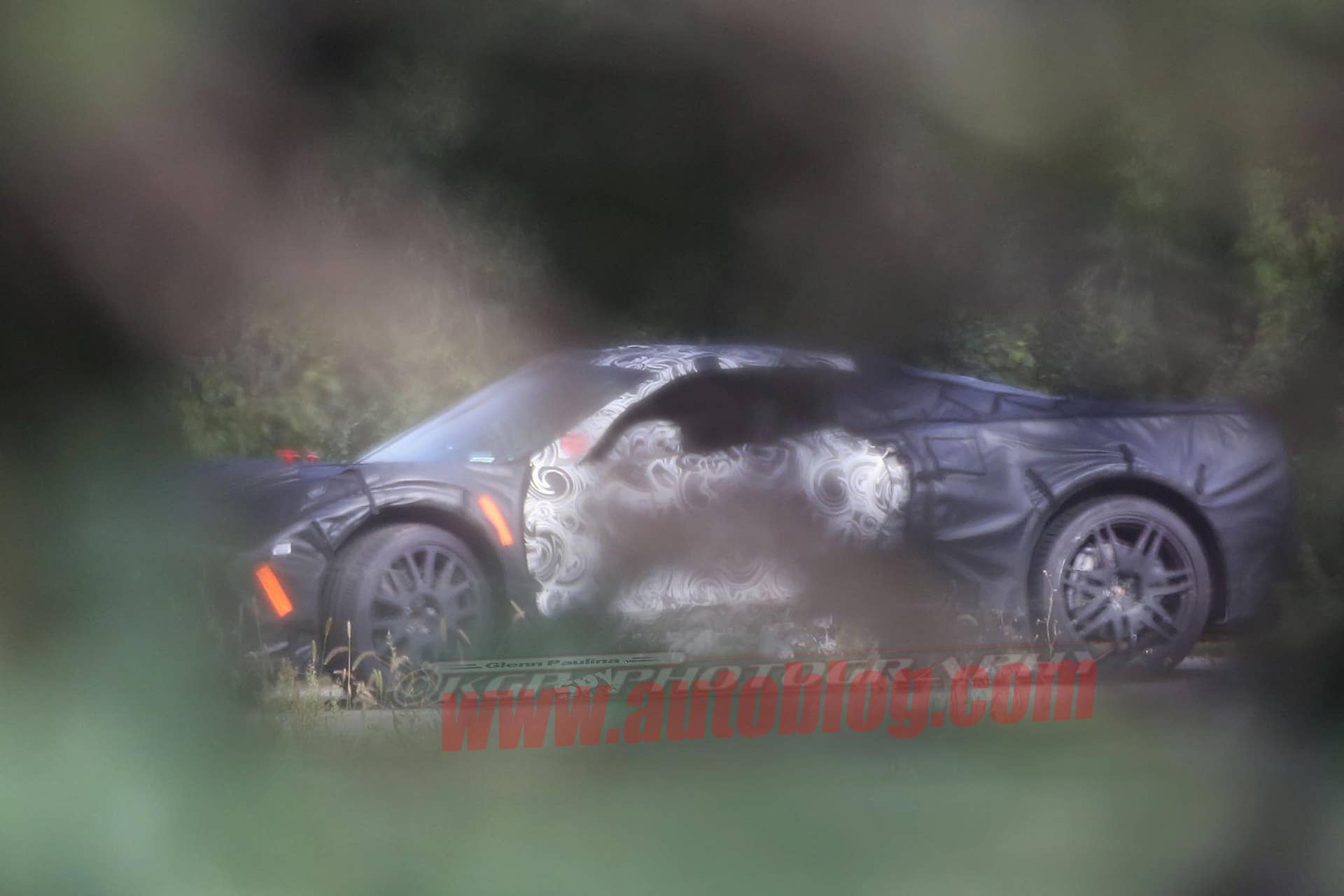 Mid-engine C8 Chevy Corvette spy shot profile