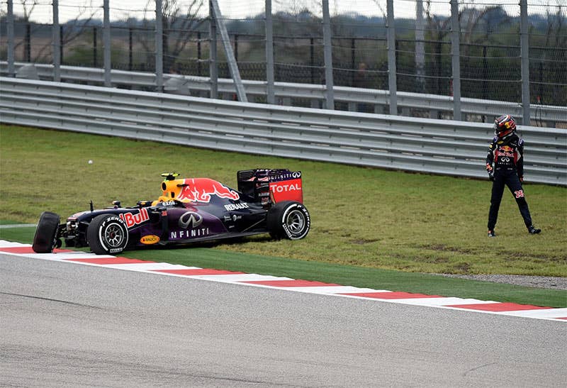 Daniil Kvyat walks away from his crashed Red Bull at the 2015 US Grand Prix.