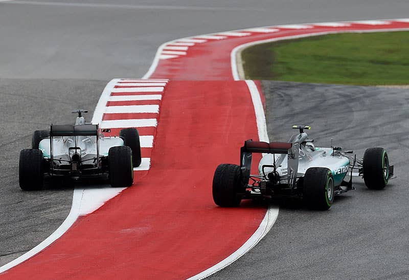 Lewis Hamilton and Nico Rosberg take the first turn at the US Grand Prix.