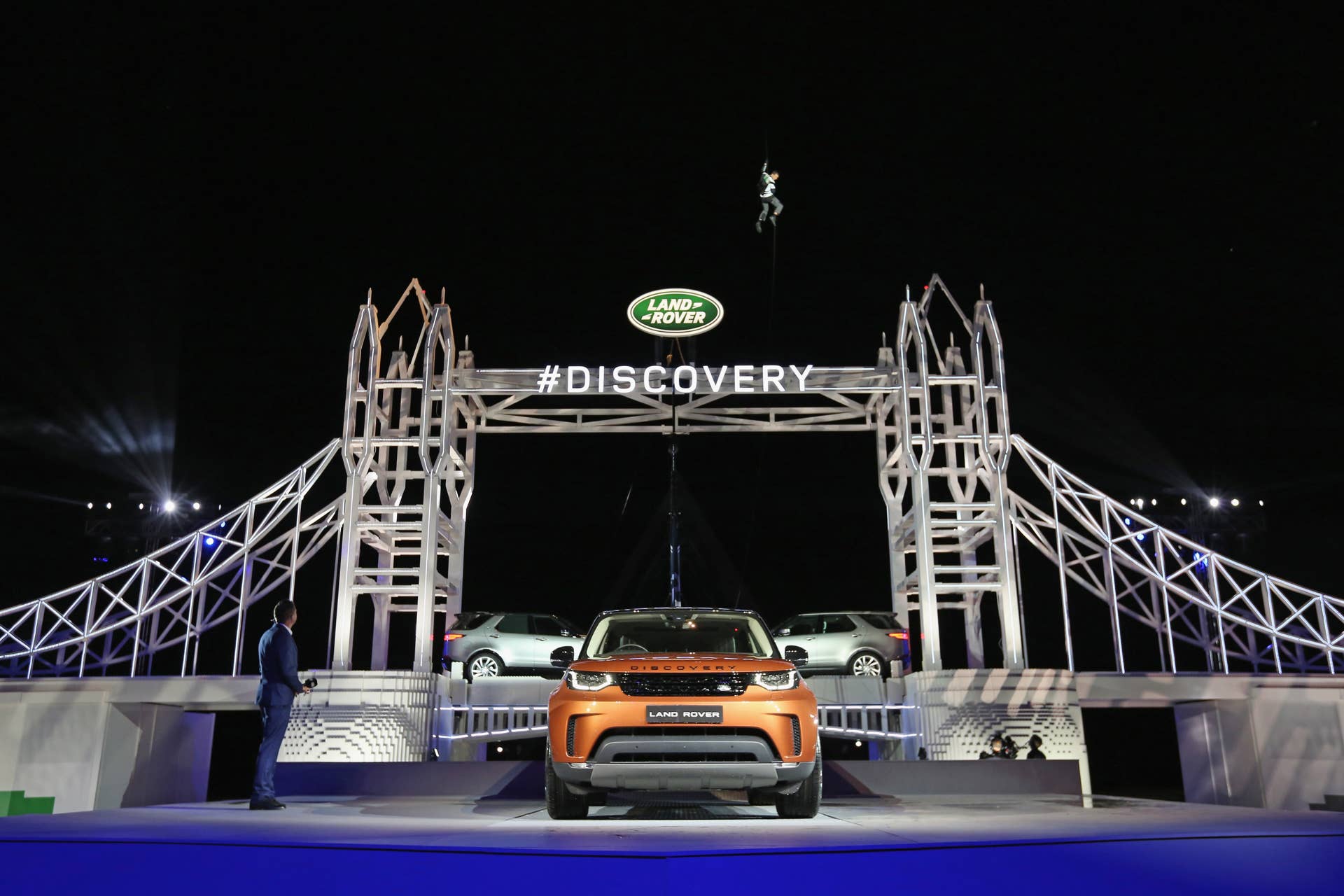 SOLIHULL, ENGLAND - SEPTEMBER 27: Bear Grylls poses as he places the final piece on a Lego structure of Tower Bridge, during the launch of Land Rover's 'New Discovery' at Packington Hall on September 27, 2016 in Solihull, England. Land Rover revealed their brand new Discovery with the help of ambassadors Zara Phillips, Bear Grylls and Sir Ben Ainslie against the backdrop of the replica of Londonâs Tower Bridge, made entirely from Lego. The structure broke the Guinness World Record for the greatest number of Lego bricks used in a sculpture with over 5.8 million pieces. (Photo by Dan Kitwood/Getty Images for Land Rover) *** Local Caption *** Bear Grylls