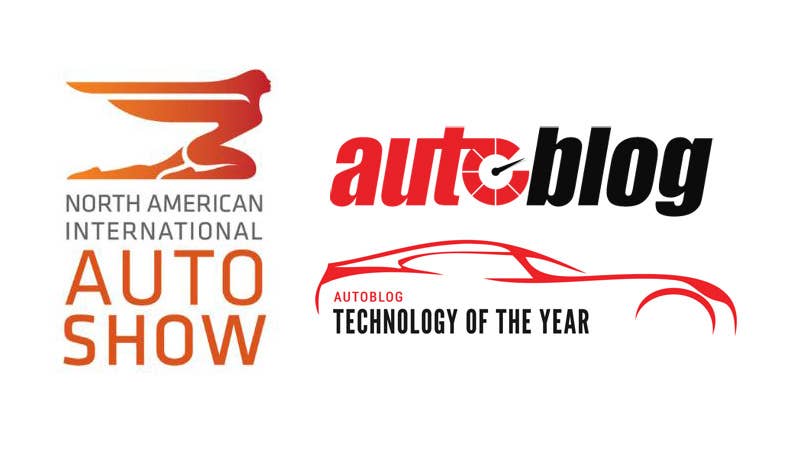 DETROIT, MI - JANUARY 13: People walk through the 2015 North American International Auto Show floor on January 13, 2015 in Detroit, Michigan. More than 5000 journalists from around the word will see approximately 45 new vehicles unveiled during the 2015 NAIAS, which opens to the public January 17 and concludes January 25. (Photo by Bill Pugliano/Getty Images)
