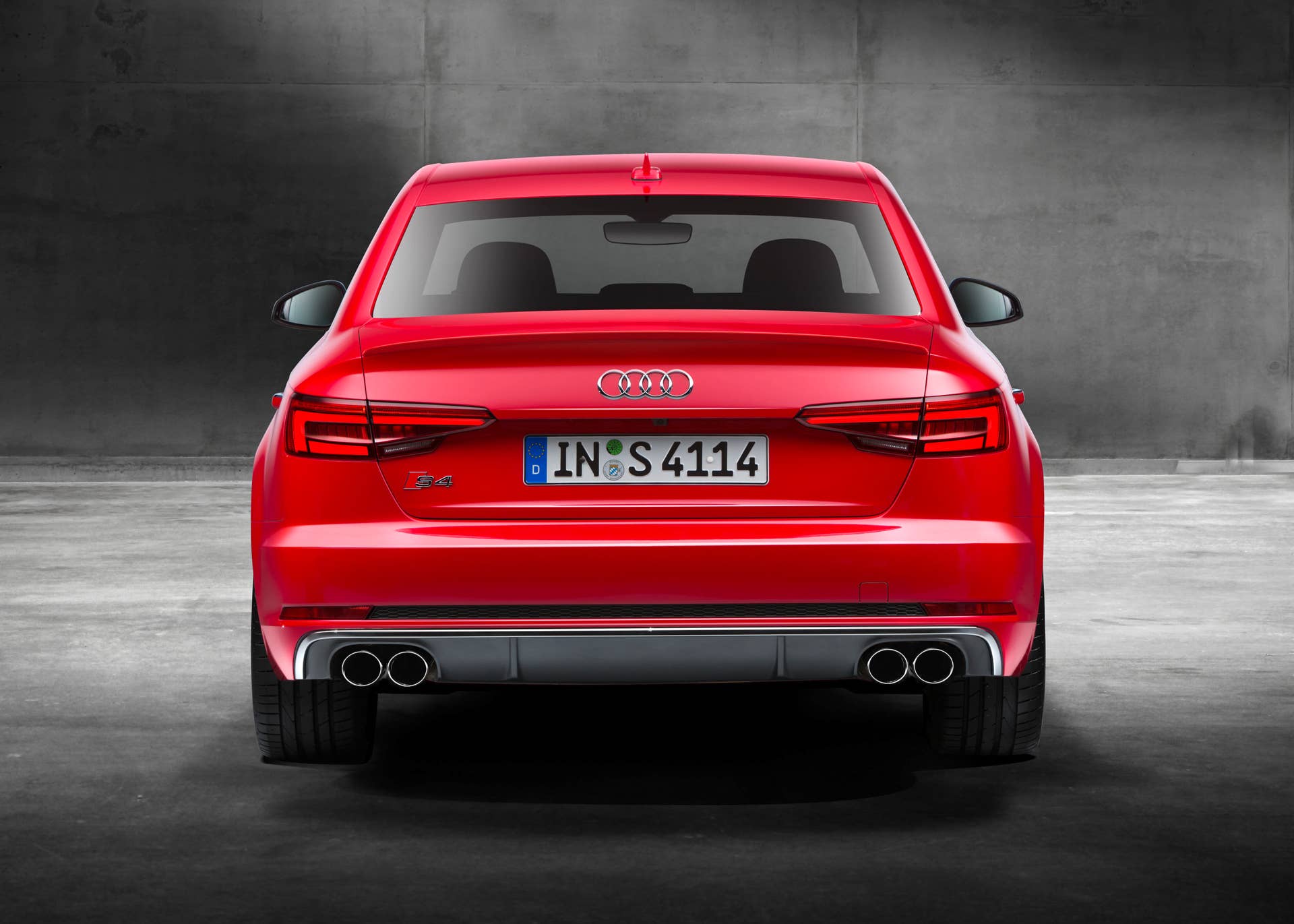 red 2017 audi s4 rear concrete
