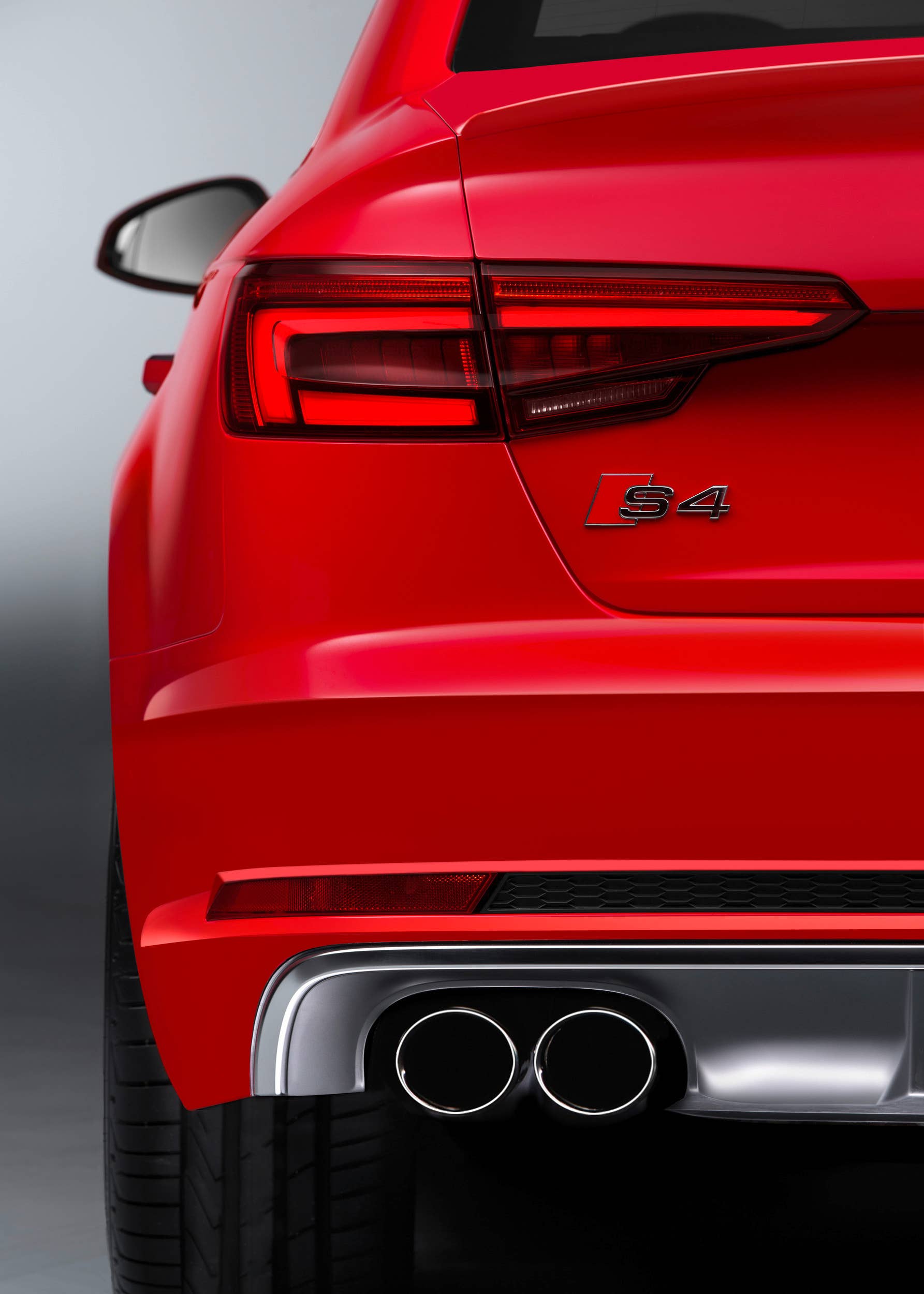 red 2017 audi s4 exhaust detail