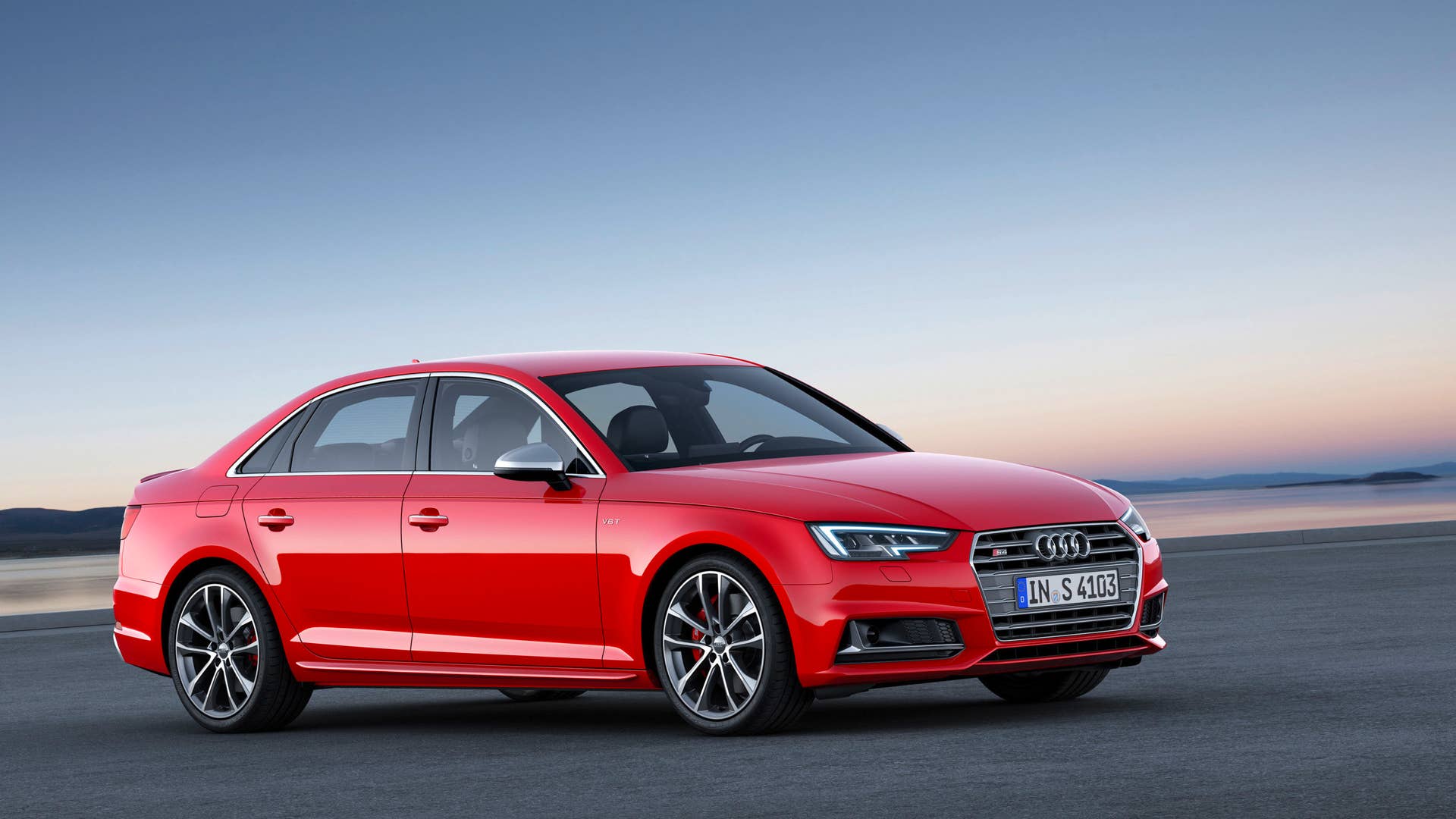 red 2017 audi s4 front three quarters outside