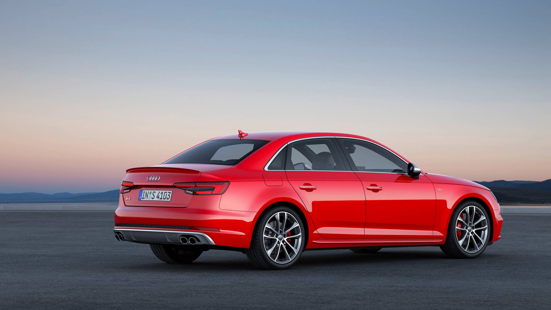 red 2017 audi s4 rear three quarters