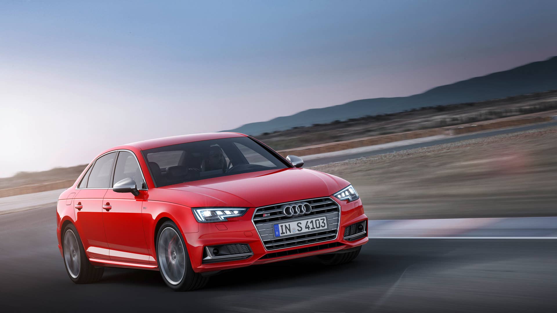 red 2017 audi s4 cornering
