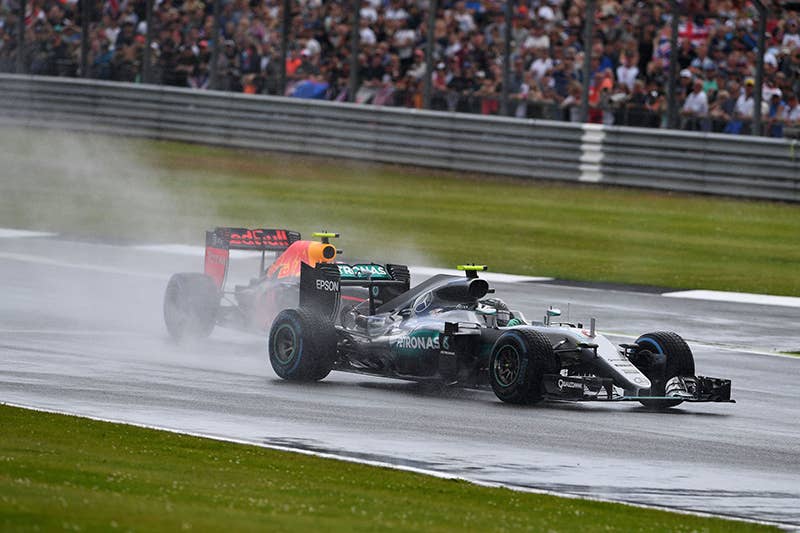 Mercedes AMG Petronas F1 Team's German driver Nico Rosberg (R) and Infiniti Red Bull racing's Belgian-Dutch driver Max Verstappen drive during the British Formula One Grand Prix at Silverstone motor racing circuit in Silverstone, central England, on July 10, 2016
