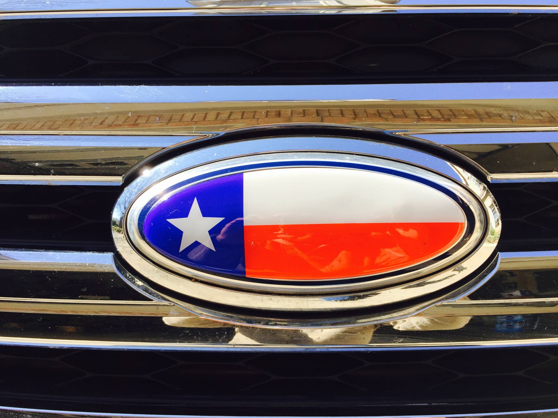 Lone Star emblem on truck grill.