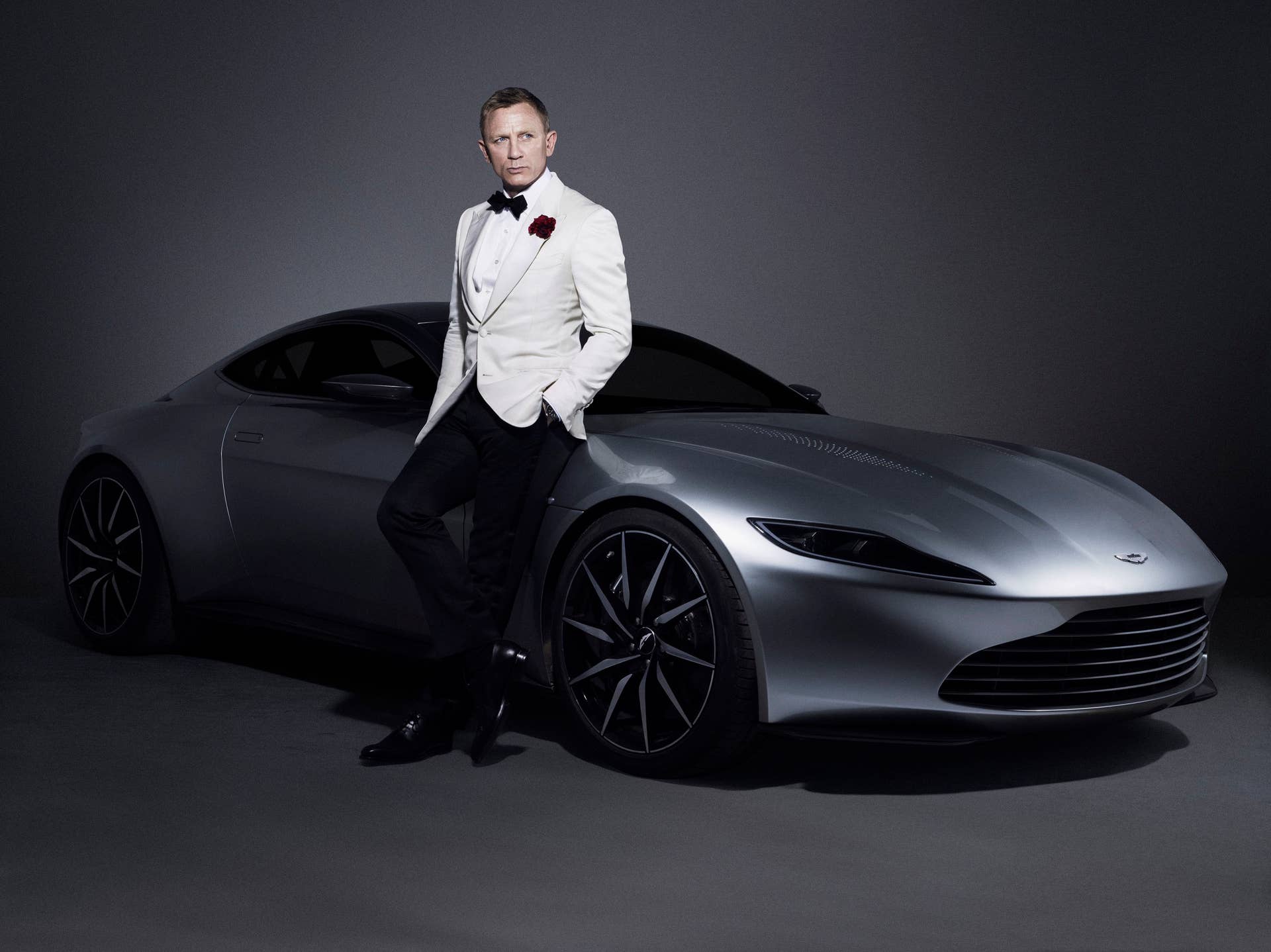 aston martin db10 three quarters with daniel craig