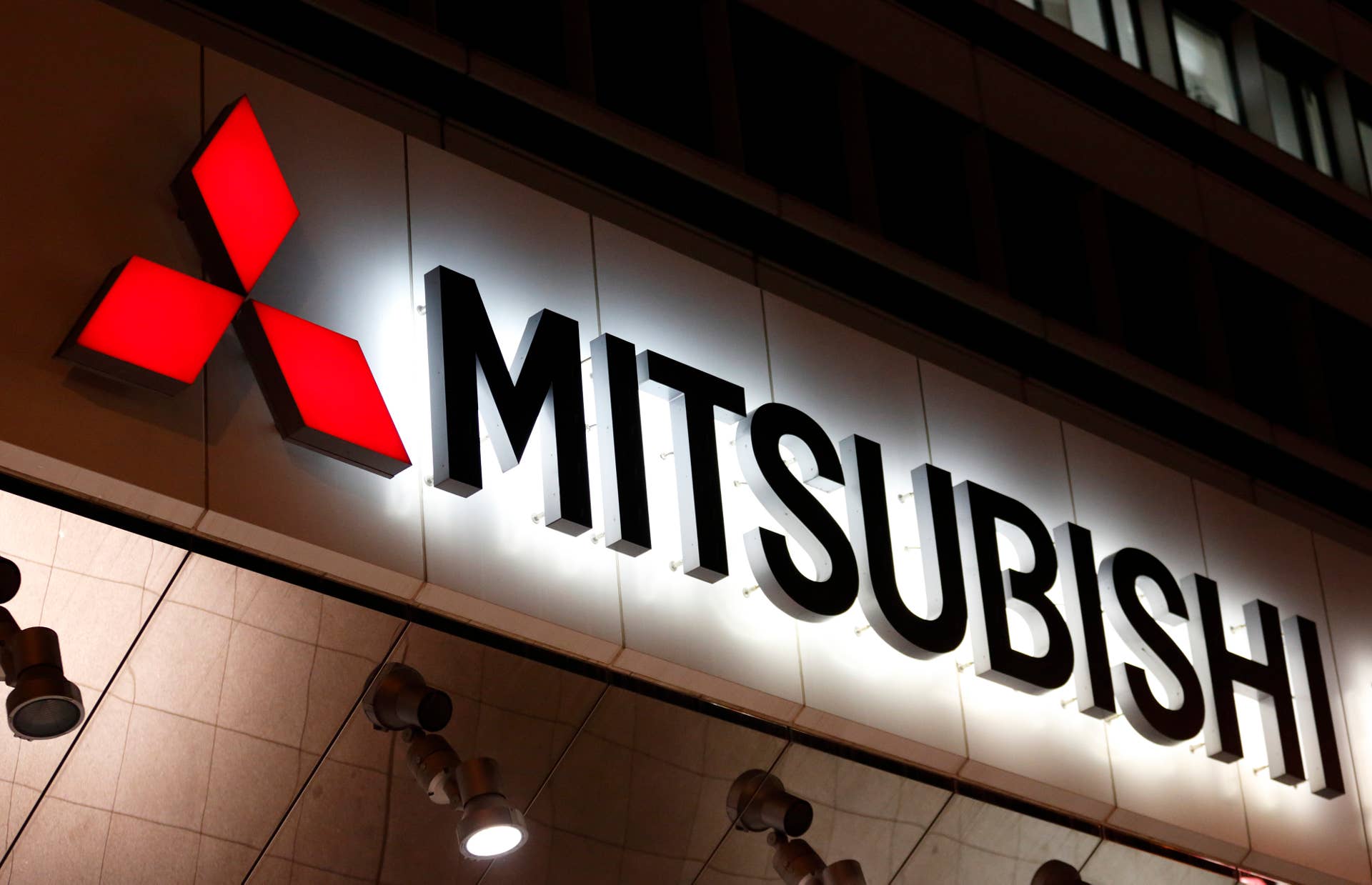 TOKYO, JAPAN - APRIL 20: The Mitsubishi Motors logo is displyed outside the company's headquarters on April 20, 2016 in Tokyo, Japan. Mitsubishi Motors share plunged more than 15% after the Japanese car maker announced it has mishandled the fuel economy test data. (Photo by Tomohiro Ohsumi/Getty Images)