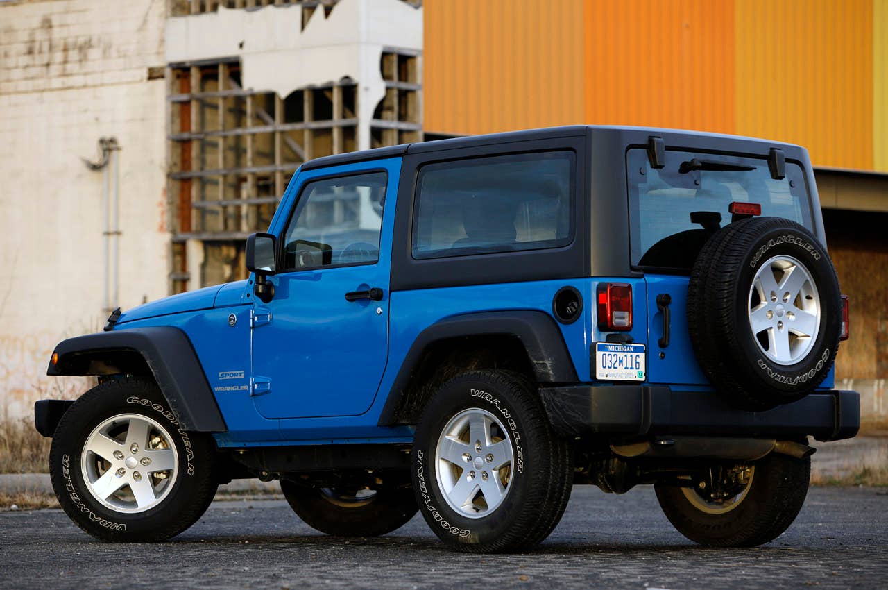 2012 Jeep Wrangler Sport rear 3/4 view