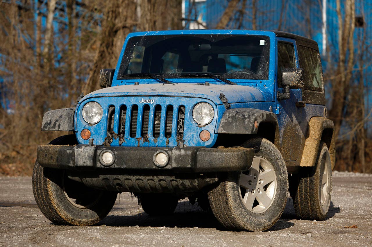 2012 Jeep Wrangler Sport front 3/4 view