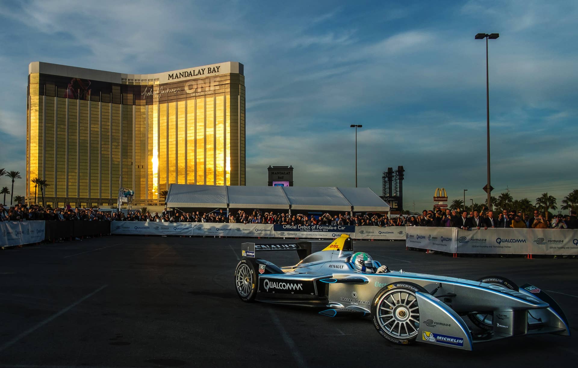 Official driver Lucas di Grassi demonstrates Formula Es new fully-electric race car, the Spark-Renault SRT_01E, entertaining crowds with a high-speed display around the Mandalay Bay Resort & Casino during the 2014 International CES on January 6, 2014 in Las Vegas, Nevada. Formula Es new fully-electric race car, the Spark-Renault SRT_01E, capable of speeds in excess of 150mph, gave invited guests, media and onlookers their first chance to see and hear the cars that will compete in the new FIA Formula E Championship - the worlds first fully-electric racing series beginning in September. AFP PHOTO/JOE KLAMAR (Photo credit should read JOE KLAMAR/AFP/Getty Images)