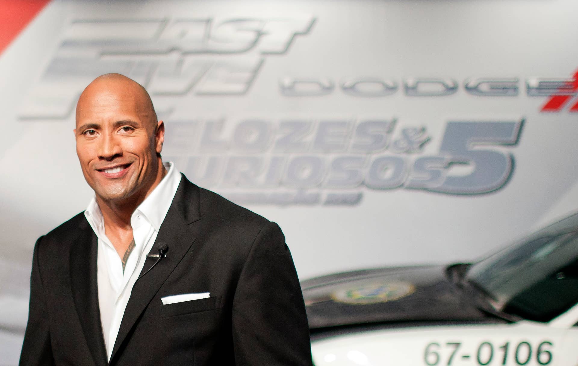 RIO DE JANEIRO, BRAZIL - APRIL 15: Dwayne Johnson (The Rock) poses for photographers during the premiere of the movie 'Fast and Furious 5' at Cinepolis Lagoon on April 15, 2011 in Rio de Janeiro, Brazil. (Photo by Buda Mendes/LatinContent/Getty Images)