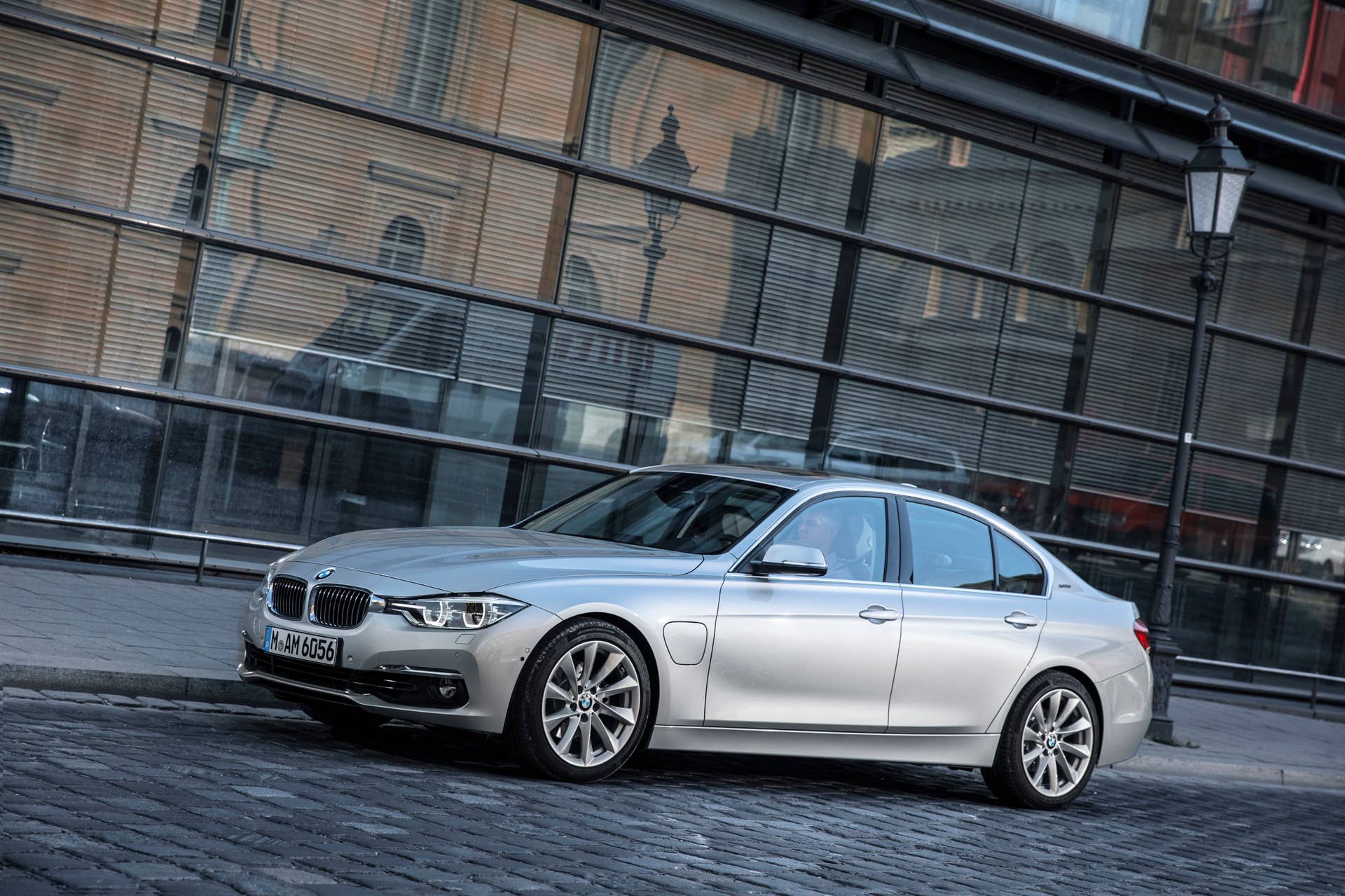 bmw 330e parked on street