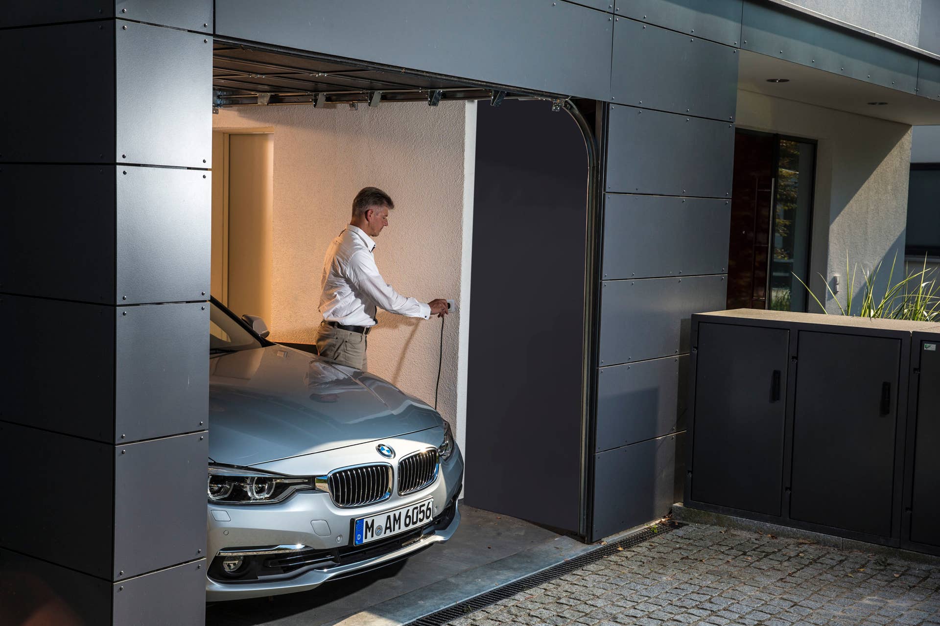 bmw 330e in garage