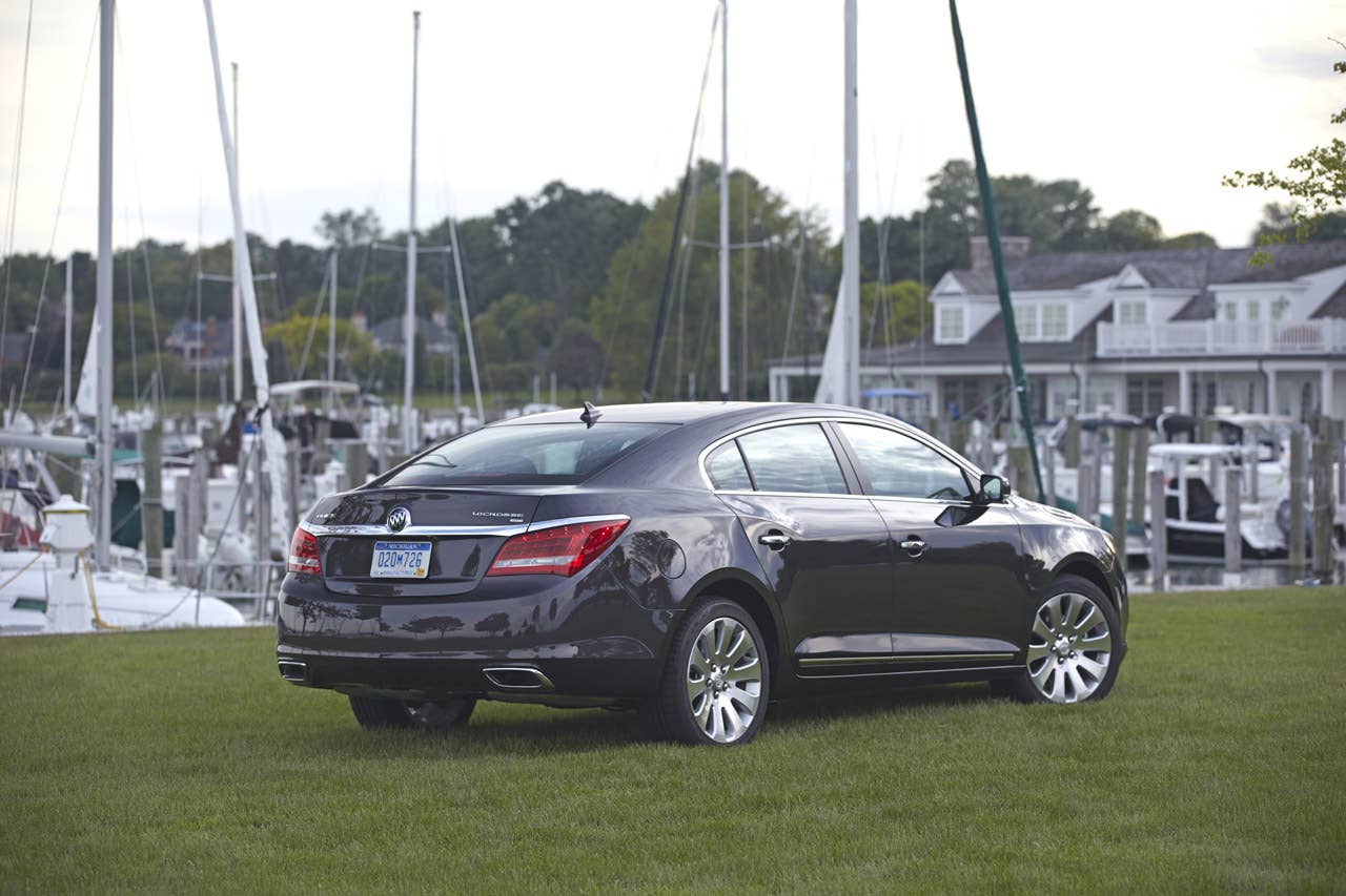 2014 Buick LaCrosse 1SL AWD with Midnight Amethyst Metallic exterior color and 19 Alloy Wheels.  rear view