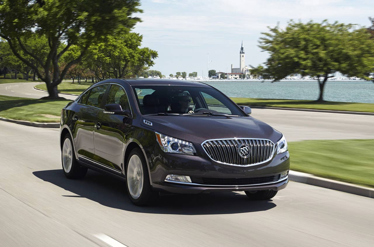 2014 Buick LaCrosse 1SL AWD with Baroque Red Metallic exterior color and 19 Alloy Wheels. Driving  front view
