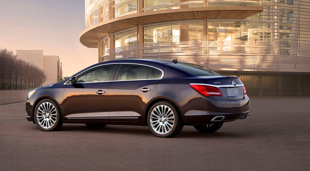 2014 Buick LaCrosse 3.6L V6, side view with Midnight Amethyst exterior Metallic exterior color and 20-inch premium painted Alloy wheels
