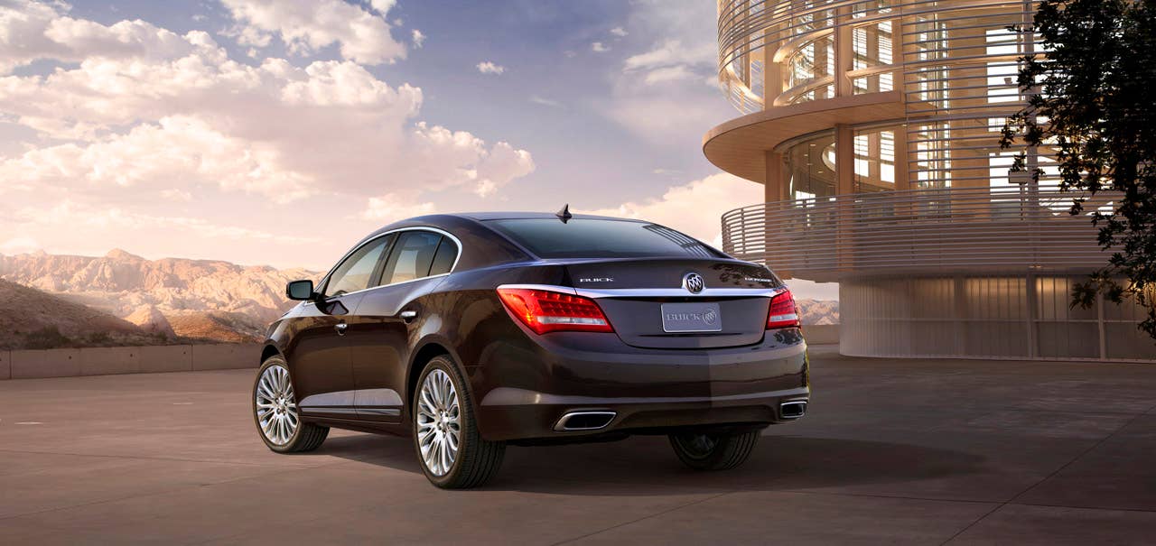 2014 Buick LaCrosse 3.6L V6,  rear view with Midnight Amethyst exterior Metallic exterior color and 20-inch premium painted Alloy wheels