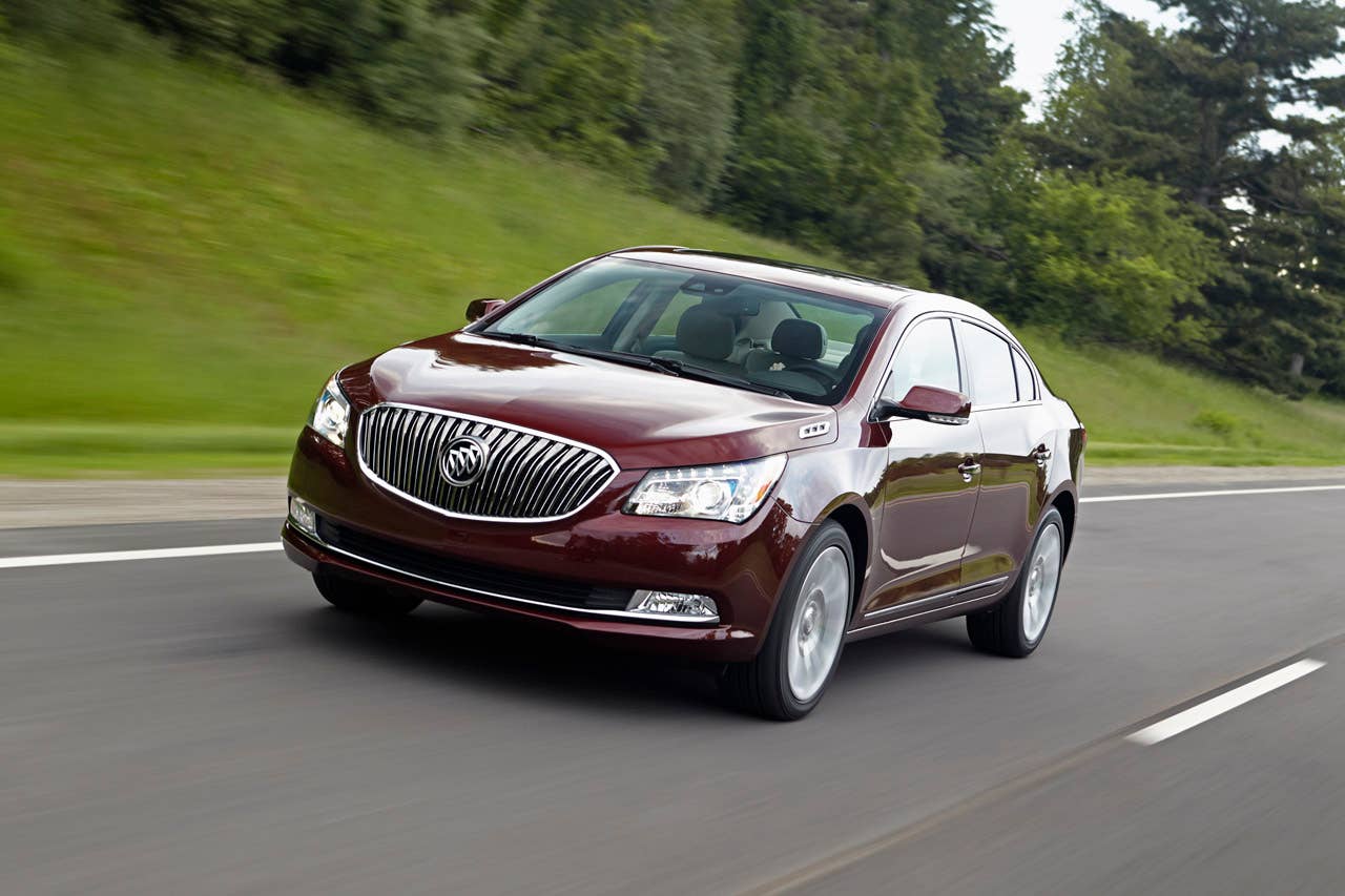 2014 Buick LaCrosse 1SL AWD with Baroque Red Metallic exterior color and 19 Alloy Wheels. Driving  front view