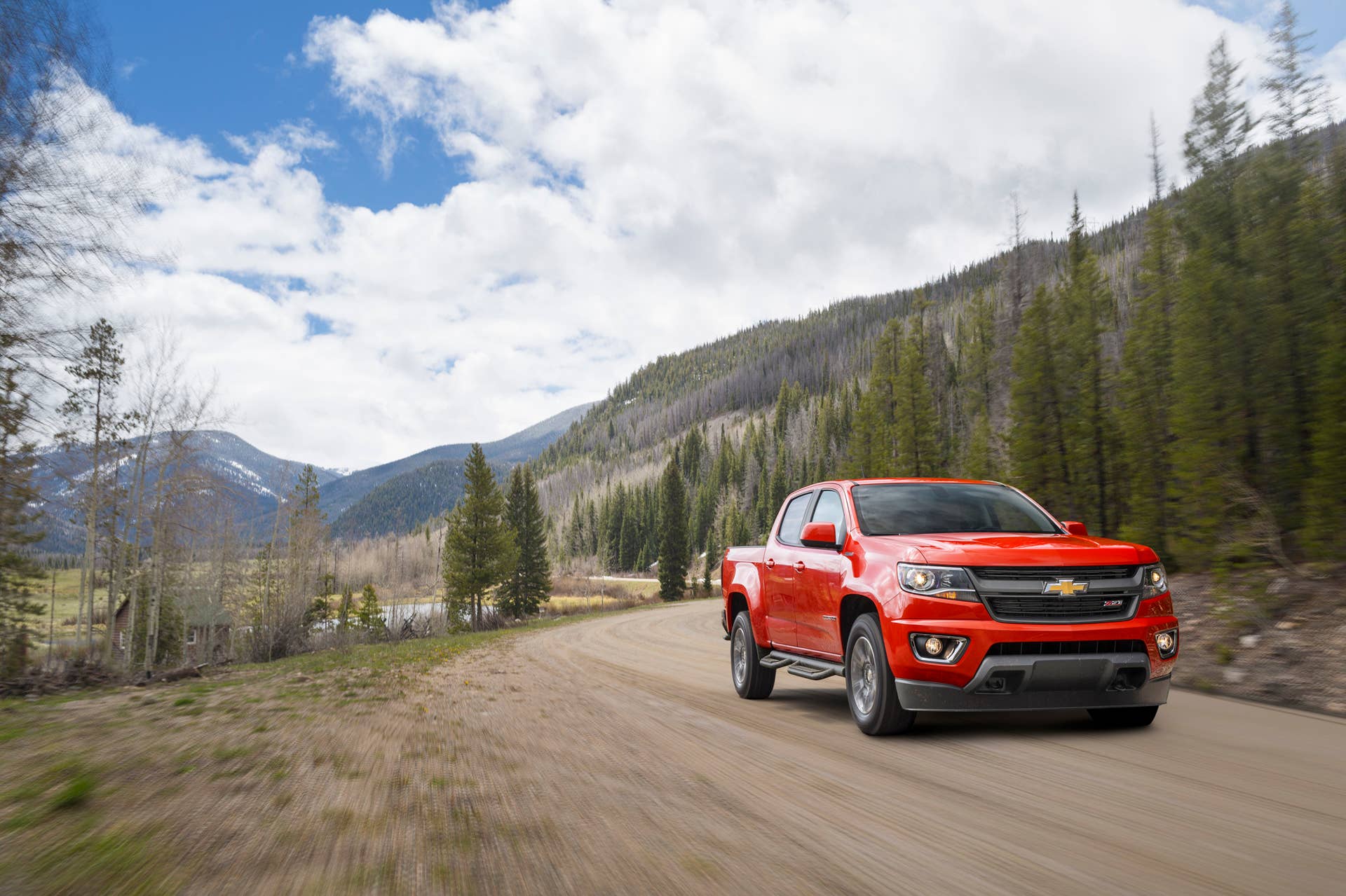 red 2016 chevy colorado duramax front in forest