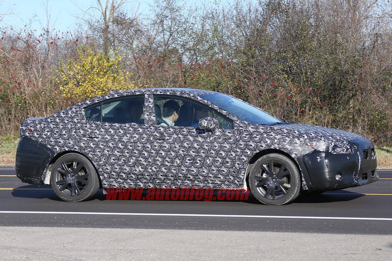 camouflaged 2017 subaru impreza spy shots profile